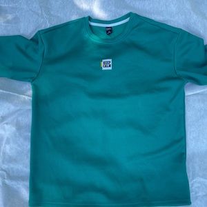 Woman oversized green T-shirt